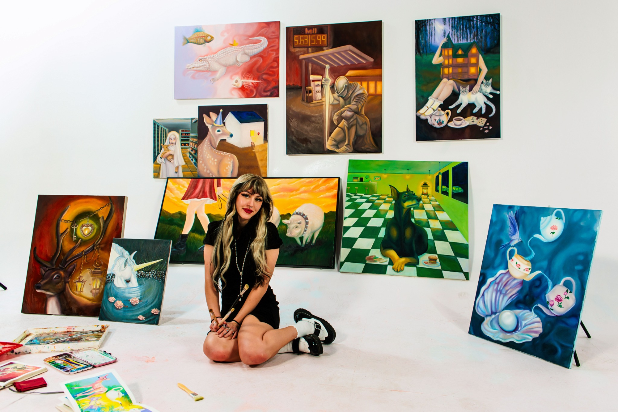 Lauren painting in studio